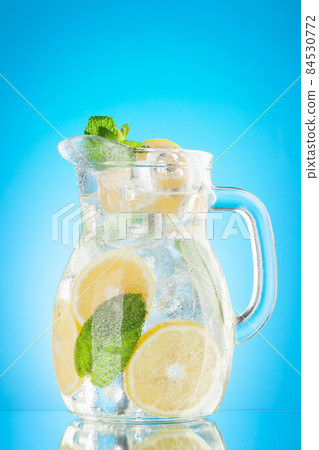 Lemonade pitcher with lemon Lemonade pitcher with lemon 84530772