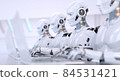 Four Robots working with laptop 84531421