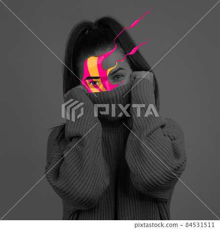 Conceptual image with black and white portrait of young girl with bright colored spots on her face. Concept of mental health, dreams, imagination 84531511