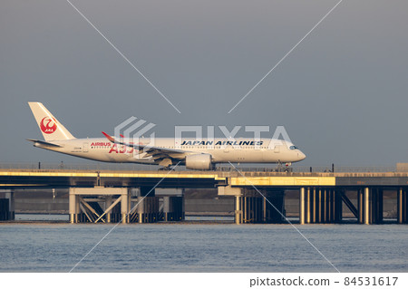 Scenery of Haneda Airport, taxiing passenger plane, Japan Airlines 84531617