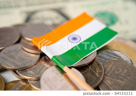 Stack of coins with India flag on white background. Stack of coins with India flag on white background. 84533211