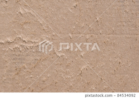 Brown cardboard sheet abstract background, cardboard box texture and background. Detail of peeling brown paper box material old vintage pattern for design art work Brown cardboard sheet abstract background, cardboard box texture and background. Detail of peeling brown paper box material old vintage pattern for design art work 84534092