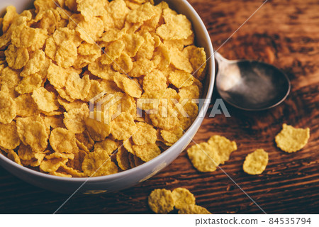 White bowl of corn flakes White bowl of corn flakes 84535794