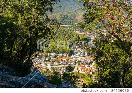 view from the mountain to the town in the valley view from the mountain to the town in the valley 84536086