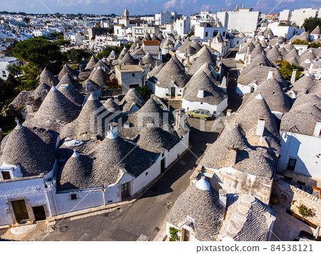 City of Alberobello in Italy with its famous historic Trulli houses City of Alberobello in Italy with its famous historic Trulli houses 84538121