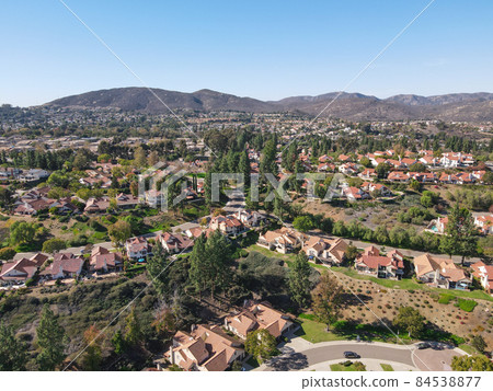 Aerial view of residential houses community in San Diego, USA. Aerial view of residential houses community in San Diego, USA. 84538877