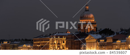 The panoramic footage of the winter night city Saint-Petersburg with picturesque reflection on water, Isaac cathedral on background, Blagoveshchensky bridge, old name is the lieutenant Schmidt The panoramic footage of the winter night city Saint-Petersburg with picturesque reflection on water, Isaac cathedral on background, Blagoveshchensky bridge, old name is the lieutenant Schmidt 84539807