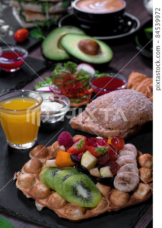 Breakfast or brunch set for two person on rustic wooden table 84539972