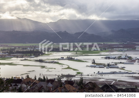 Devastating Flood Natural Disaster in the city and farmland after storm Devastating Flood Natural Disaster in the city and farmland after storm 84541008