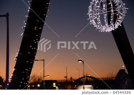 Dusk sky and illuminations 84544389