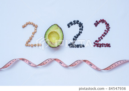 2022 Happy New Year and New You with fruit and vegetable; Avocado, adlay and Bean on table. Goals, Healthy, Motivation, Resolution, Time to New Start, dieting and world food day concept 84547936