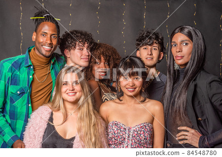 Portrait of multi-ethnic friends posing and looking at camera 84548780