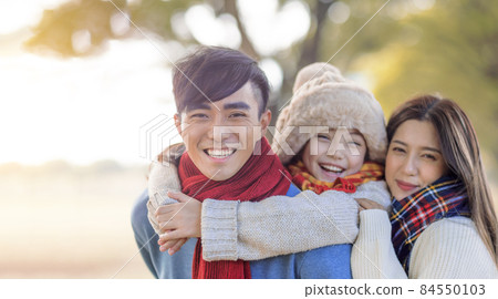 happy asian family in winter park happy asian family in winter park 84550103