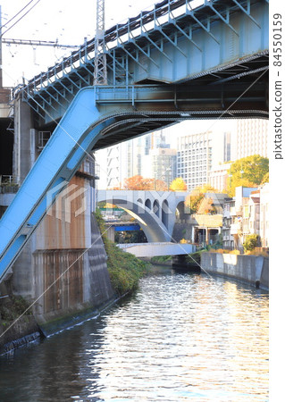 Kanda River Bridge (Kandagawa Kyoryo) and Hijiribashi (back) over the Kanda River Kanda River Bridge (Kandagawa Kyoryo) and Hijiribashi (back) over the Kanda River 84550159