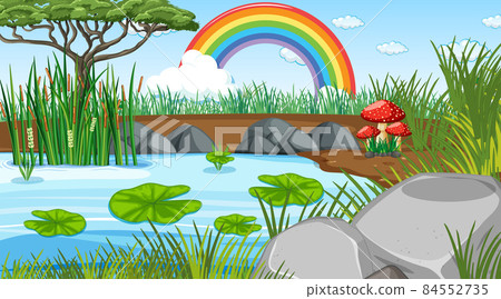 Nature scene background with rainbow in the sky Nature scene background with rainbow in the sky 84552735