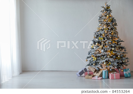 white christmas tree with gifts decoration for the new year 84553264
