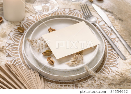 Wedding Table place with Blank paper card and bohemian decorations Wedding Table place with Blank paper card and bohemian decorations 84554632