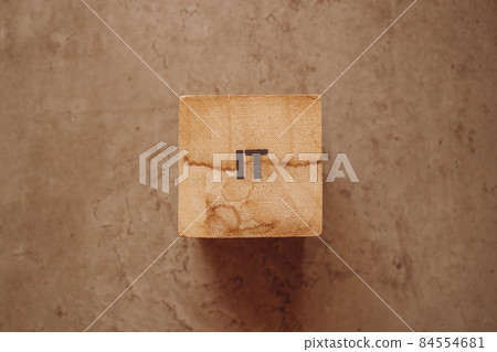 IT acronym text on wooden cube block on the old concrete table background 84554681
