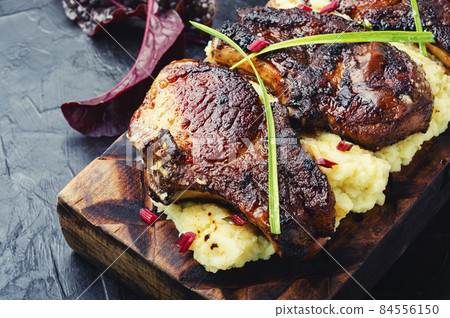 Fried meat with mashed potatoes Fried meat with mashed potatoes 84556150