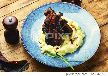 Fried meat with mashed potatoes Fried meat with mashed potatoes 84556152