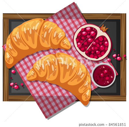Croissant with pomegranate on a wooden plate isolated 84561851