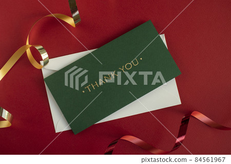 Ribbon and letter of appreciation on red background 84561967