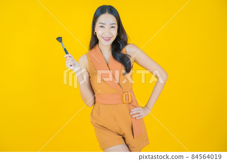 Portrait beautiful young asian woman with make up brush cosmetic Portrait beautiful young asian woman with make up brush cosmetic 84564019