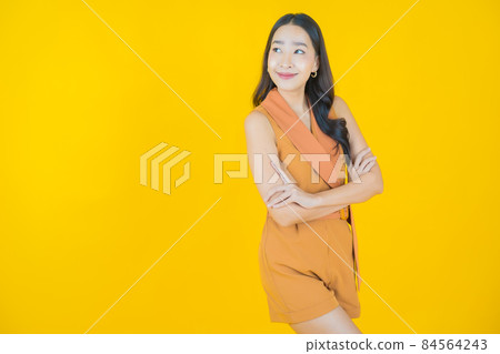 Portrait beautiful young asian woman smile with action Portrait beautiful young asian woman smile with action 84564243
