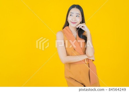 Portrait beautiful young asian woman smile with action Portrait beautiful young asian woman smile with action 84564249