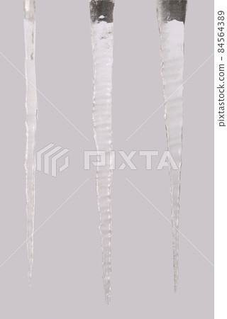 Icicles isolated on a grey (Three clipping path) 84564389