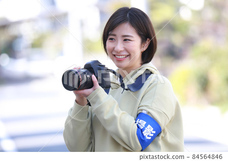 Female cameraman image 84564846