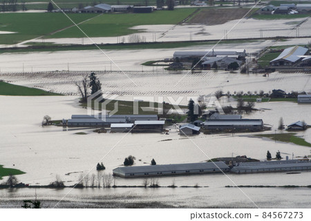 Devastating Flood Natural Disaster in the city and farmland after storm Devastating Flood Natural Disaster in the city and farmland after storm 84567273