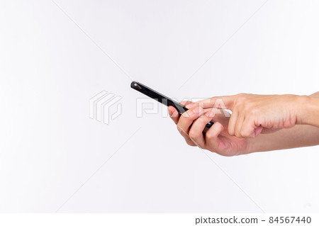Close up man hands using mobile smart phone. Close up man hands using mobile smart phone. 84567440