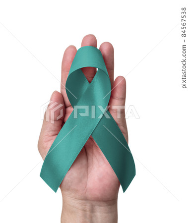 Teal ribbon awareness isolated on white (clipping path) for Ovarian Cancer, Polycystic Ovary Syndrome (PCOS) disease, Post Traumatic Stress Disorder (PTSD), Obsessive Compulsive Disorder (OCD) Teal ribbon awareness isolated on white (clipping path) for Ovarian Cancer, Polycystic Ovary Syndrome (PCOS) disease, Post Traumatic Stress Disorder (PTSD), Obsessive Compulsive Disorder (OCD) 84567538