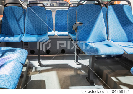 modern and comfortable city bus, an electric bus or a hydrogen bus cabin with suspended 84568165