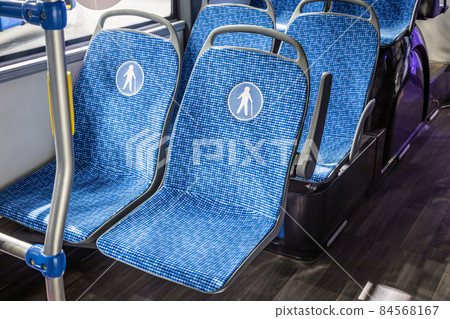 seats on a city bus or electric bus for the elderly and people seats on a city bus or electric bus for the elderly and people 84568167