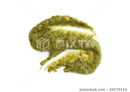 Tasty Pesto sauce isolated on white background 84570310