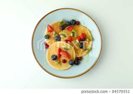Concept of delicious dessert with pancakes on white background 84570551