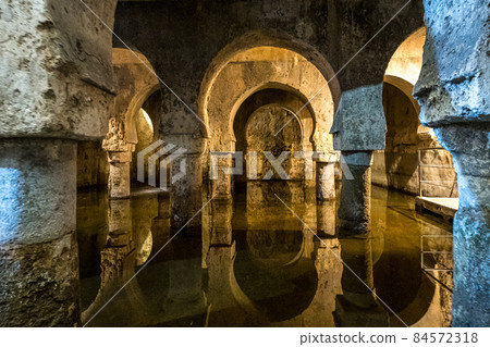 Moorish cistern Aljibe in Caceres. Former mosque under the Muslim rule in Spain. Moorish cistern Aljibe in Caceres. Former mosque under the Muslim rule in Spain. 84572318