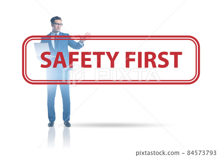 Safety first concept with businessman Safety first concept with businessman 84573793