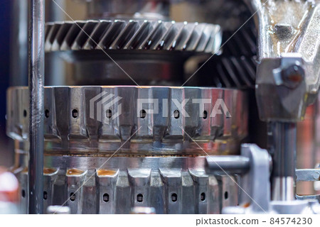 Close-up helical gears in car automatic transmission 84574230