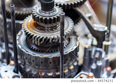 Close-up helical gears in car automatic transmission 84574231