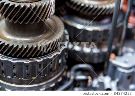 Close-up helical gears in car automatic transmission 84574232