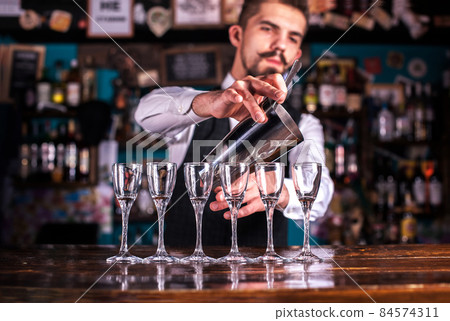 Bearded Female bartender surprises with its skill bar visitors Bearded Female bartender surprises with its skill bar visitors 84574311