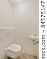 Interior of small clean restroom in miniature style 84575147