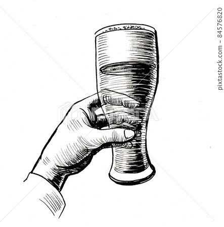 Hand holding a glass of beer. Ink black and white drawing Hand holding a glass of beer. Ink black and white drawing 84576820