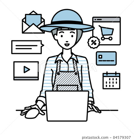 一位農婦坐在辦公桌前，在 PC 上做網上商店或營銷工作 84579307