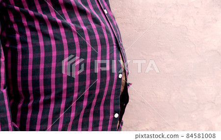 Fat man wearing tight shirt, appearance insecurities 84581008