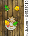Homemade Christmas cookies on wooden table. 84583010