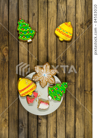 Homemade Christmas cookies on wooden table. Homemade Christmas cookies on wooden table. 84583010